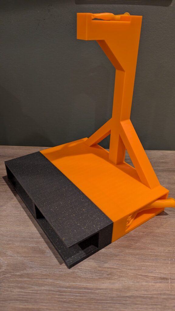 Finished 3D-printed headphone stand, empty, showing the compartments and support structure
